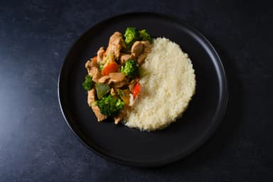 Chicken with garden sauce and rice