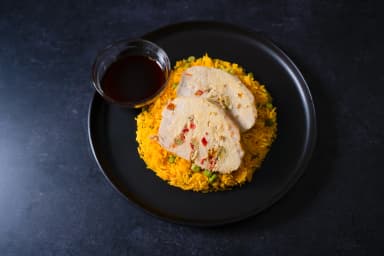 Dijon pork and yellow rice with peas