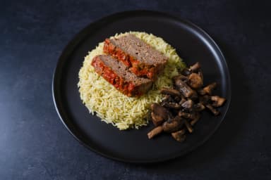 Meat pie with mushrooms and cilantro rice