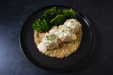 Turkey meatball with béchamel sauce, quinoa, and roasted broccoli