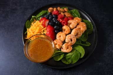 Shrimp salad with fruits and nuts